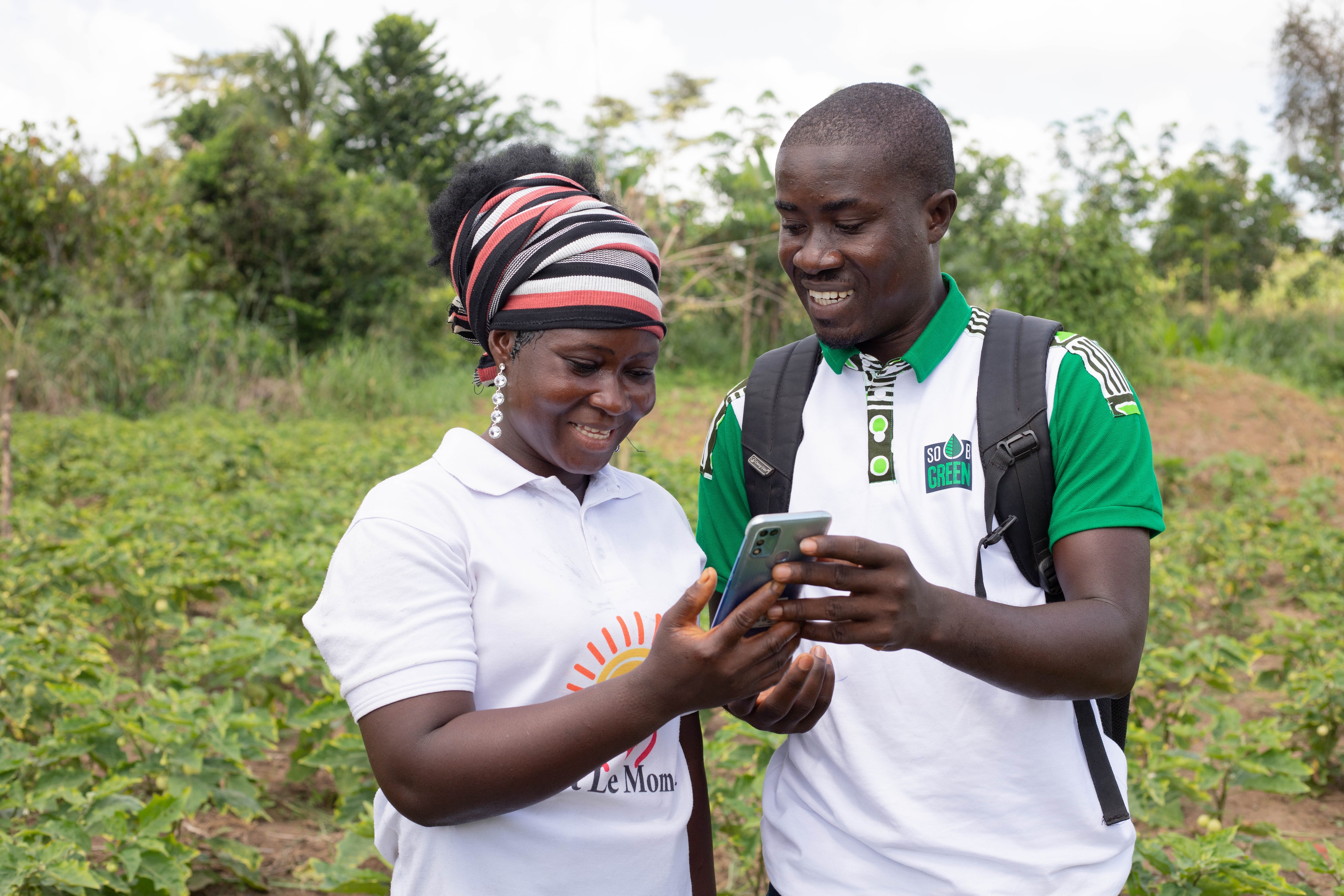 Man and woman looking at phone